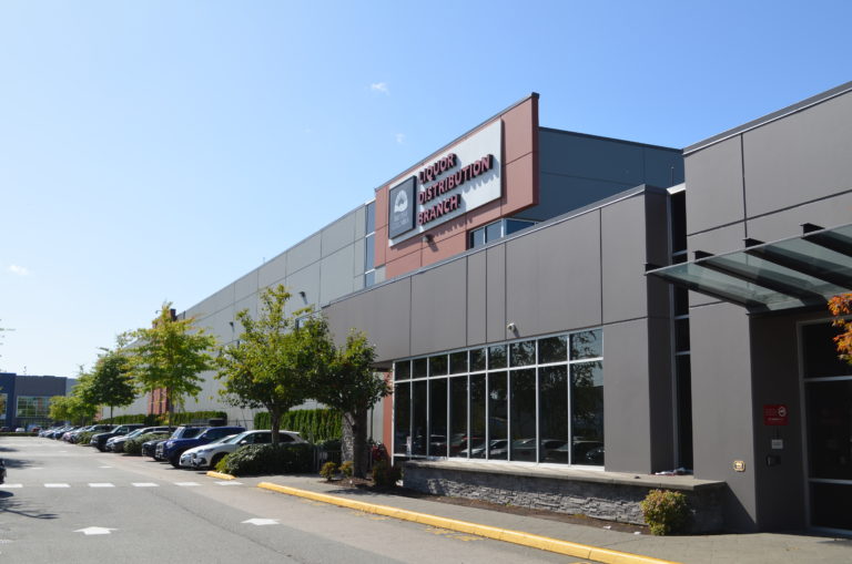 Commercial warehouse repaint and concrete repair in Delta by Crestline Painting
